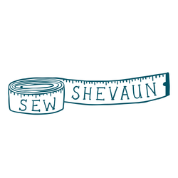 Logo of a teal coloured measuring tape with Sew Shevaun written on it.